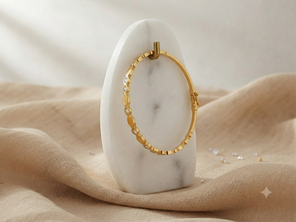 Serpentine Scalloped Crystal Accent Gold-Toned Bangle