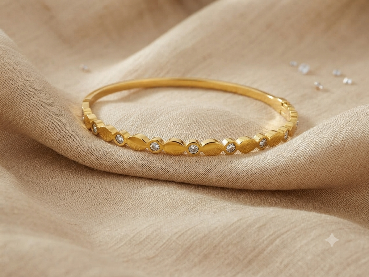 Serpentine Scalloped Crystal Accent Gold-Toned Bangle